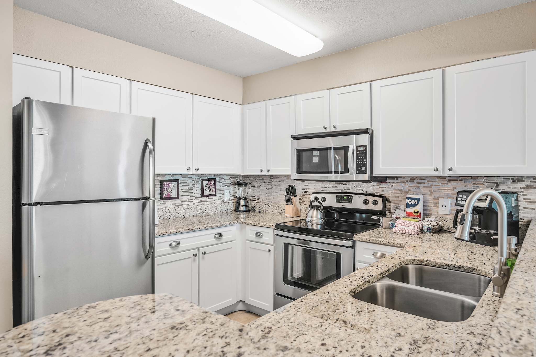 Full kitchen with stainless appliances