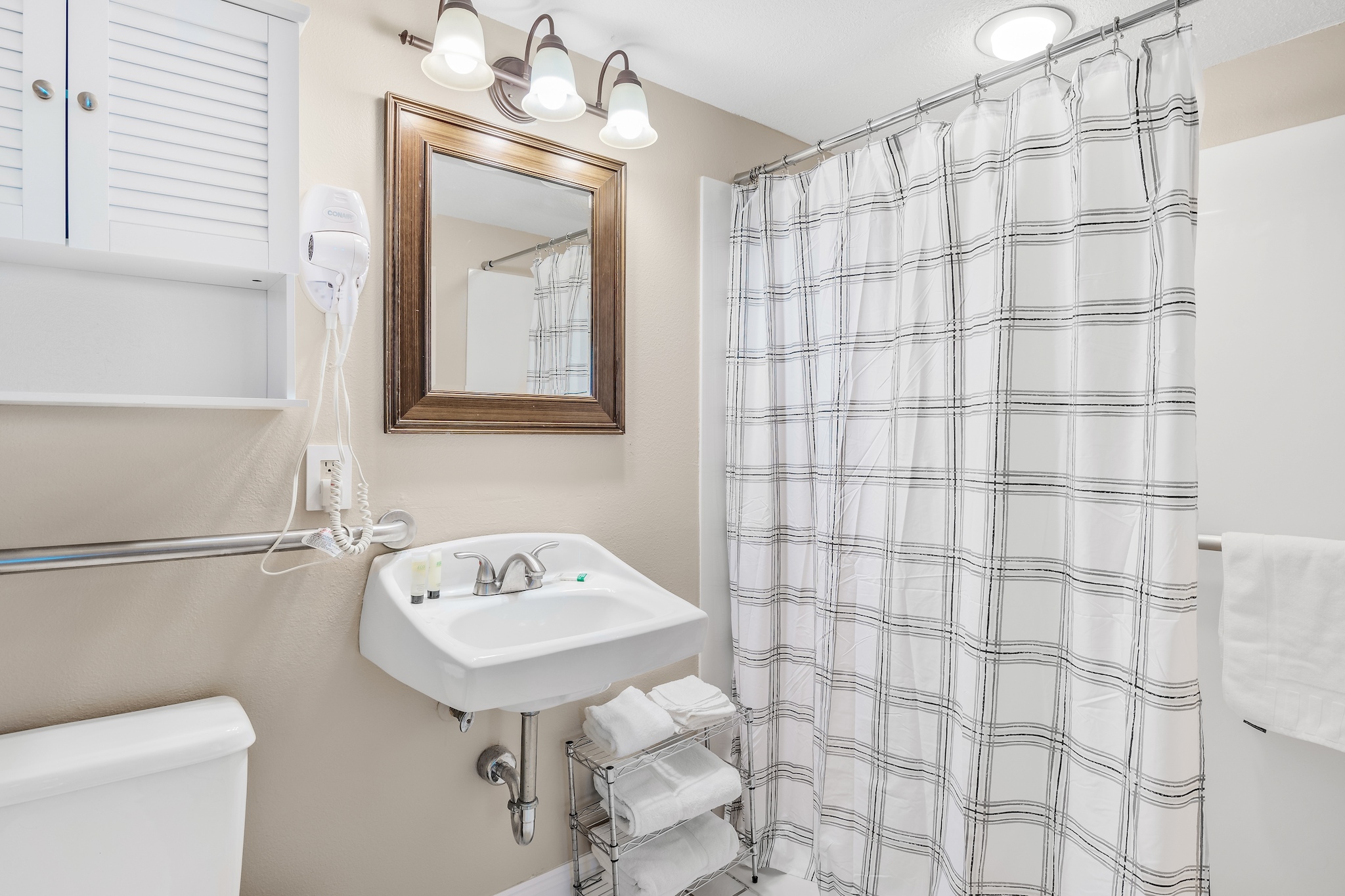 Guest Bathroom with walk in shower and rails