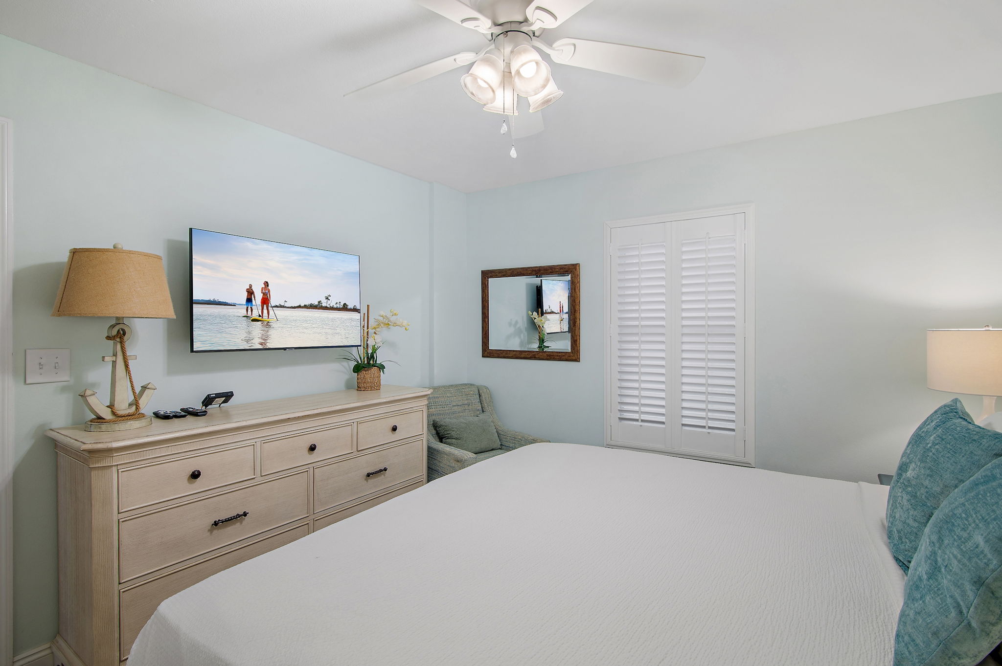 Master bedroom with king size bed and Smart TV