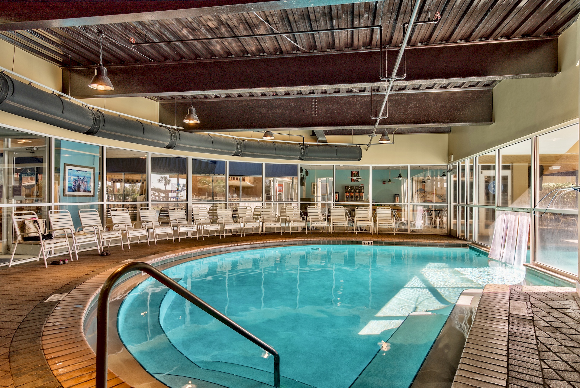 Indoor pool with swimming access to outdoor