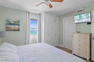 2nd bedroom with king bed and smart TV