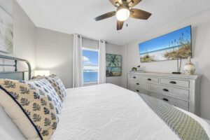 Master bedroom with king bed and smart TV