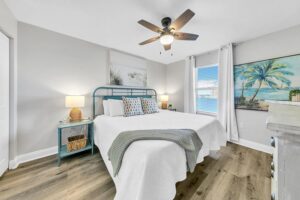 Master bedroom with king bed and smart TV