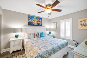 Master bedroom with king bed and 50" Smart TV